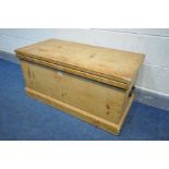 A PINE BLANKET CHEST with twin iron drop handles, width 98cm x depth 47cm x height 48cm (