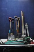A COLLECTION OF GARDENING TOOLS to include various different spades, forks, loppers and rakes etc