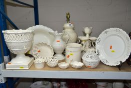 A GROUP OF CERAMIC LEEDSWARE AND OTHER CREAMWARE PIECES, to include thirteen items, a pierced urn-