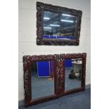 THREE LATE 20TH CENTURY FOLIATE WOODEN FRAMED BEVELLED EDGE WALL MIRRORS, all painted in burgundy,