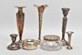 A SELECTION OF SILVER AND WHITE METAL ITEMS, to include three silver weighted posy vases, a silver