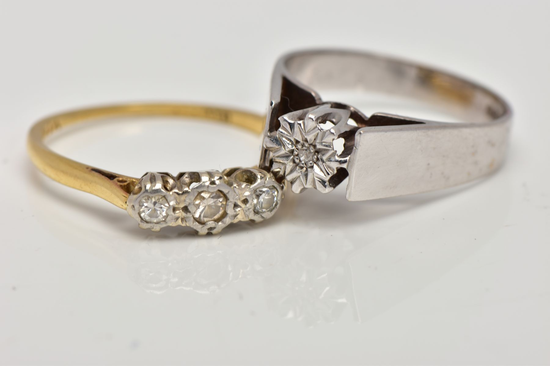 TWO DIAMOND RINGS, one 9ct white gold ring designed with a single illusion set round brilliant cut - Image 2 of 3