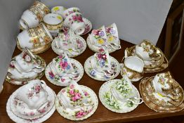 A QUANTITY OF ASSORTED ROYAL ALBERT BONE CHINA CUPS, SAUCERS AND TEA PLATES, ETC, IN A VARIETY OF