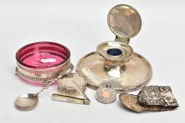 A SELECTION OF SILVER ITEMS, to include a table ink well of a circular form, with a weighted base,