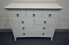 A MODERN WHITE SIDEBOARD/CHEST OF THREE SHORT OVER SIX LONG DRAWERS, width 120cm x depth 44cm x