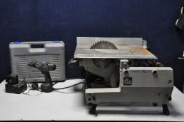 A ELU FLIP TOP TGS173 A4 TABLE SAW with blade and a Elu BSA52K cordless drill/driver with charger