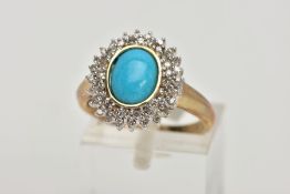 A YELLOW METAL TURQUIOSE AND DIAMOND CLUSTER RING, designed with a central oval turquoise