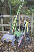 A QUANTITY OF GARDEN TOOLS including spades, forks, rakes etc