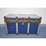 A VINTAGE BLUE AND METAL BANDED TRAVELLING TRUNK, marked Eatonia, with an internal tray, width