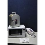 A PANASONIC NN-CT54JW CONVECTION/GRILL/MICROWAVE with instruction booklets, an 8 litre mini fridge/