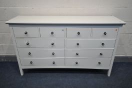 A MODERN WHITE SIDEBOARD/CHEST OF FOUR SHORT OVER SIX LONG DRAWERS, width 159cm x depth 44cm x