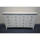 A MODERN WHITE SIDEBOARD/CHEST OF FOUR SHORT OVER SIX LONG DRAWERS, width 159cm x depth 44cm x