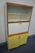 A VINTAGE KITCHEN CABINET, with a fall front door, width 92cm x depth 40cm x height 175cm and a
