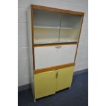 A VINTAGE KITCHEN CABINET, with a fall front door, width 92cm x depth 40cm x height 175cm and a