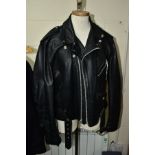 A LEATHER PERFECTO JACKET BY SCHOTT, NEW YORK, size 44, with quilted lining, zip and faux belt