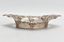 A LATE VICTORIAN SILVER PIERCED BONBON DISH, of an oval form, embossed floral design, two vacant