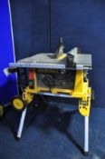 A DeWALT DW744XP table saw with rolling workstation stand and spare blades (PAT pass and working)