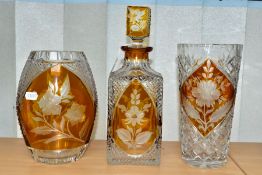 THREE PIECES OF BOHEMIAN AMBER-FLASHED GLASS, comprising a square shaped decanter and stopper,