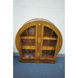 AN ART DECO WALNUT SUNBURST TWO DOOR CHINA CABINET, with wooden shelves, width 122cm x depth 34cm