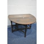 AN OAK OVAL GATE LEG TABLE, incorporating early timbers, with a single drawer, open length 139cm x