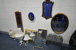 A REGENCY STYLE MAHOGANY WALL MIRROR (condition:-losses) five various other wall mirrors, a brass