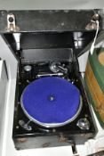 A COLUMBIA 202 PORTABLE GRAMOPHONE, in a black case, with integral winding handle, motor runs but