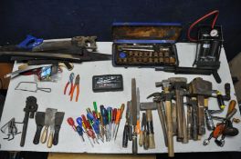 A COLLECTION OF VARIOUS TOOLS to include a selection of hand saws, screwdrivers and hammers etc