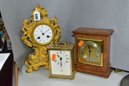 A LATE 19TH CENTURY GILT METAL MANTEL CLOCK AND TWO QUARTZ MOVEMENT CLOCKS, the gilt metal clock