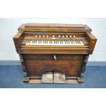 A DISTRESSED VICTORIAN WALNUT PUMP ORGAN, marked Bertheaux of Belleville Paris, width 114cm x depth