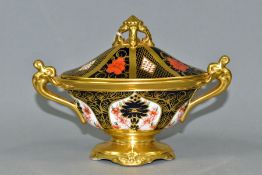 A ROYAL CROWN DERBY IMARI 1128 PATTERN TWIN HANDLED OVAL PEDESTAL BOWL AND COVER, solid gold