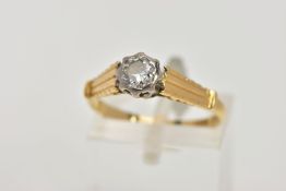 A YELLOW METAL SINGLE STONE DIAMOND RING, designed with a round brilliant cut diamond, total