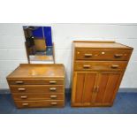 A MID CENTURY OAK TALL BOY with two drawers, width 84cm x depth 49cm x height 124cm, and a