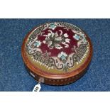A VICTORIAN CIRCULAR WALNUT AND INLAID FOOTSTOOL WITH BEADWORK TOP, on three turned feet, diameter