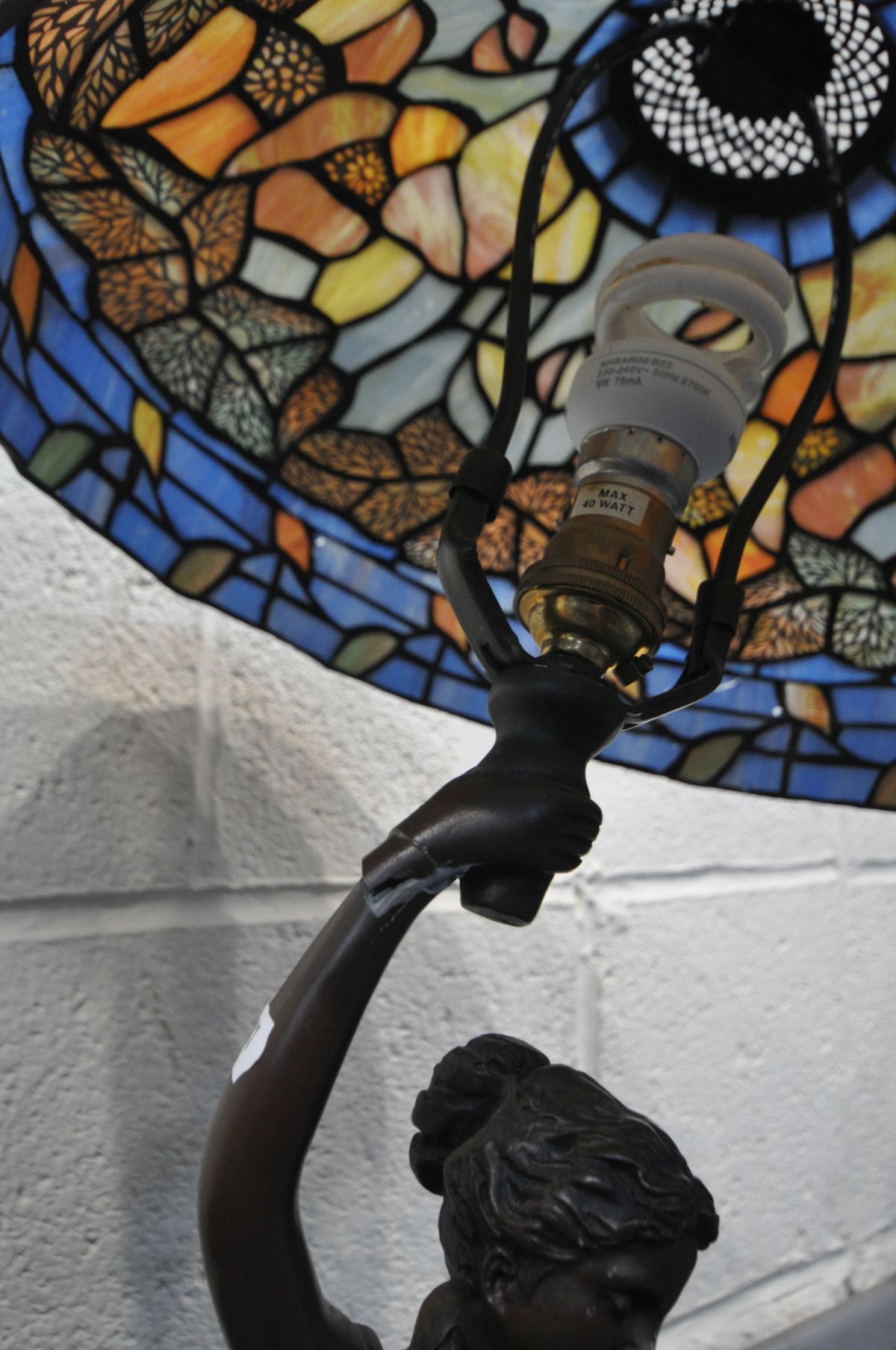 A TIFFANY STYLE FIGURAL STANDARD LAMP (condition:-broken at arm, see image) along with an ornate - Image 3 of 5