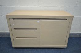 A WINSOR TIBRO OAK SIDEBOARD, with cut-away drawer pulls and soft close, comprising three drawers