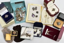 A SELECTION OF SILVER AND WHITE JEWELLERY, to include a silver charm bracelet suspending eleven