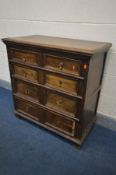 AN OAK 17TH CENTURY STYLE OAK CHEST OF FOUR LONG DRAWERS, incorporating some antique timbers,