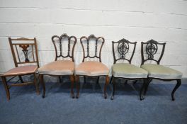 TWO PAIRS OF EDWARDIAN MAHOGANY CHAIRS, both with ornate backs (condition:-one chair with losses and