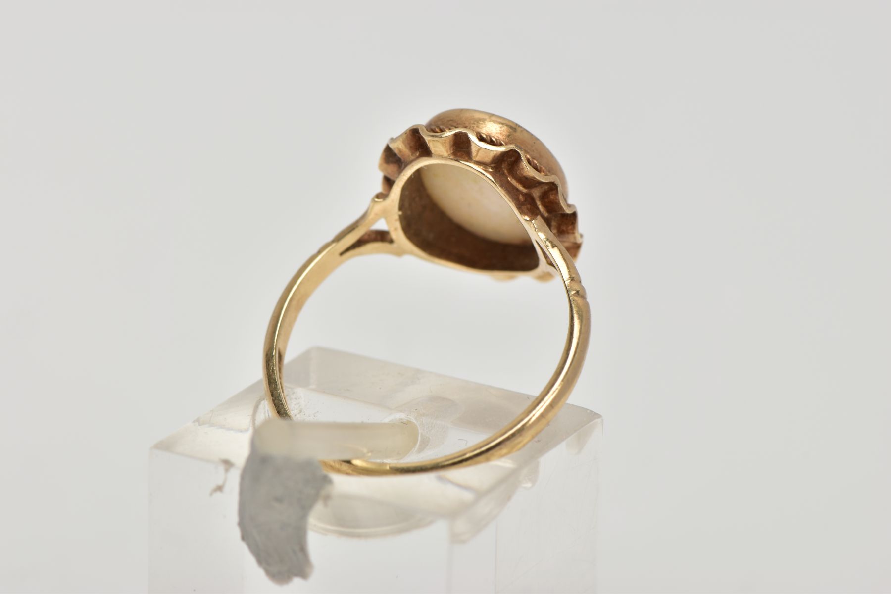 A 9CT GOLD OPAL DRESS RING, designed as an oval cabochon within a collet mount, swag surround, - Image 3 of 4