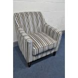 A STRIPPED UPHOLSTERED ARMCHAIR, width 74cm