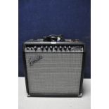 A FENDER CHAMPION 40 with, two channel amplifier with power cable (PAT pass and powers up but