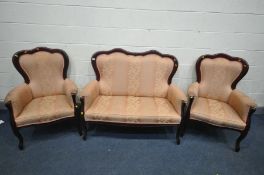 A REPRODUCTION MAHOGANY FRAMED THREE PIECE SUITE, pink upholstered, comprising a sofa, length