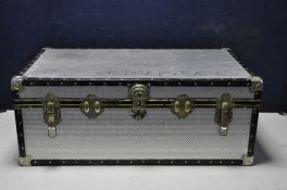 A ALUMINIUM MOSSMAN TRAVELING TRUNK measuring 90cm width 51cm depth locked with no key some