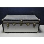 A ALUMINIUM MOSSMAN TRAVELING TRUNK measuring 90cm width 51cm depth locked with no key some