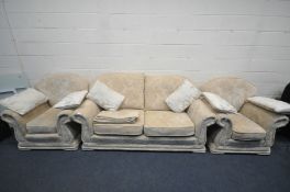 A BEIGE UPHOLSTERED THREE PIECE SUITE, comprising a two seater sofa, length 196cm and a pair of