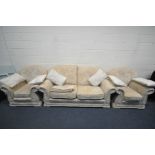 A BEIGE UPHOLSTERED THREE PIECE SUITE, comprising a two seater sofa, length 196cm and a pair of