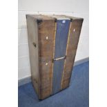 AN UPRIGHT COCKTAIL TRUNK, the exterior decorated with a vertical strip of beaten aluminium,