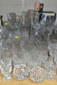 APPROXIMATELY SIXTY PIECES OF CUT CRYSTAL AND OTHER GLASS WARES, to include a Waterford Crystal