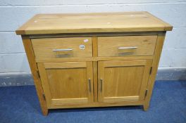 A LIGHT OAK SIDEBOARD with two drawers, width 96cm x depth 47cm x height 78cm