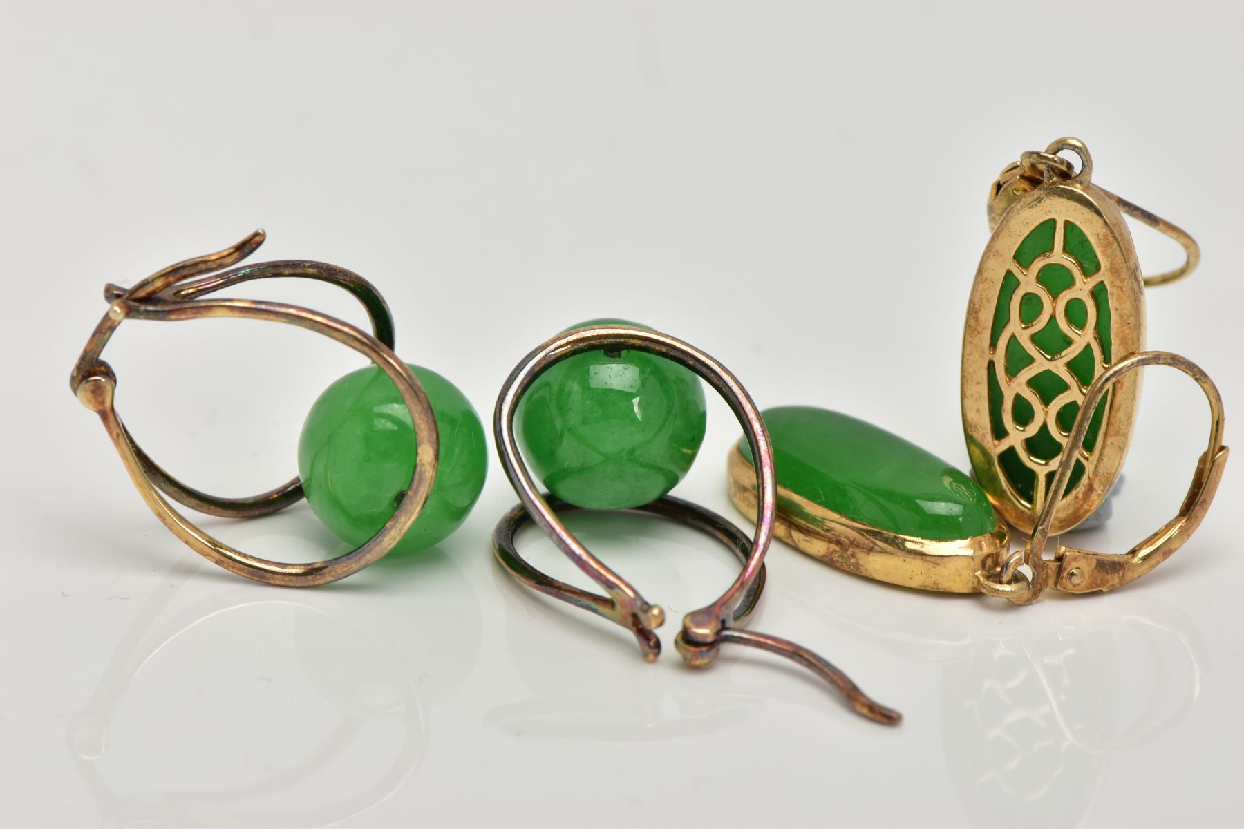 TWO PAIRS OF GREEN HARDSTONE EARRINGS, the first of an oval form, set with an oval green stone - Image 2 of 2